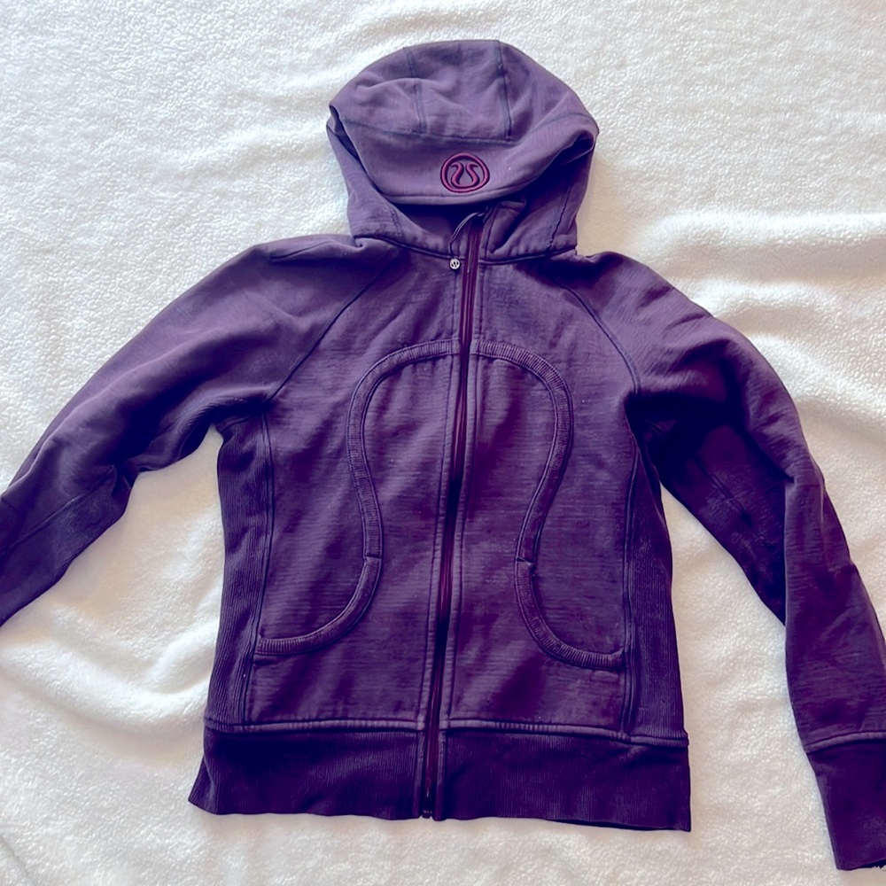 Lululemon jacket size 10. In used condition but still has life left.